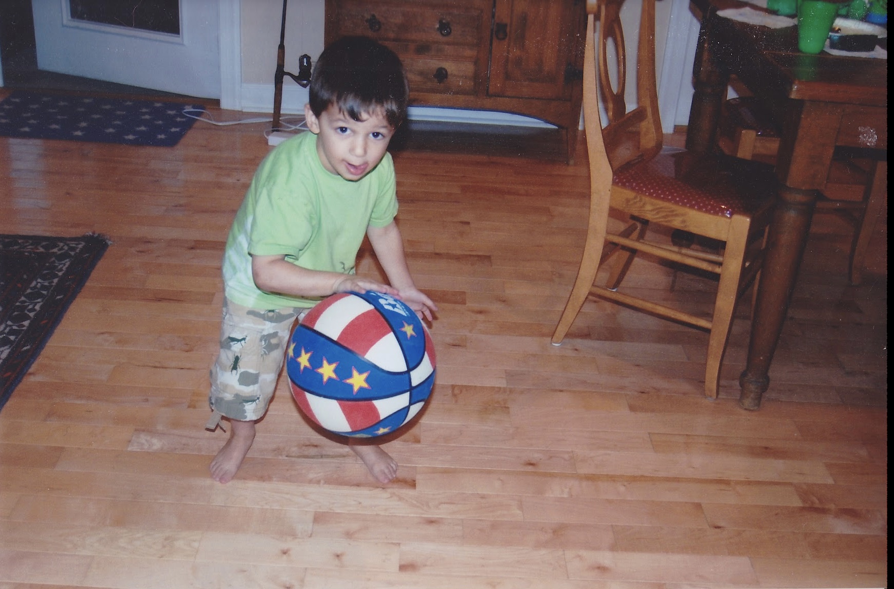 Baby Marcos playing basketball